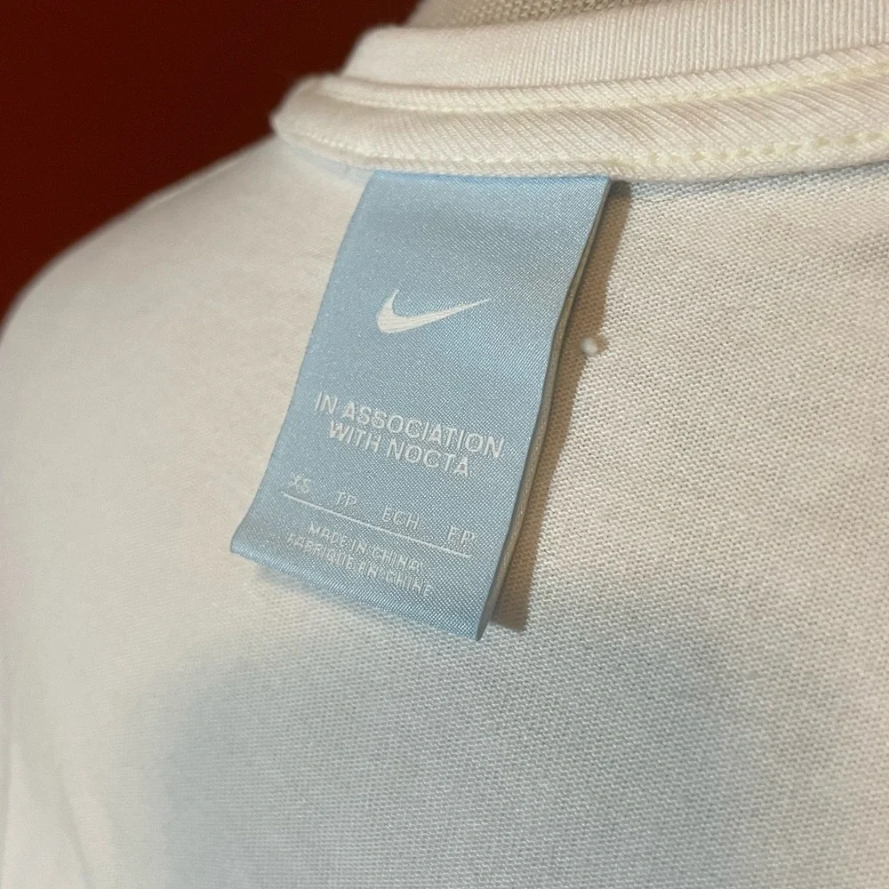 Nike x Nocta Men’s‎ White Drake Center Swoosh Athletic Slim Crewneck Tee Shirt